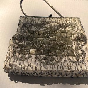 Hand beaded handstitched person purse hello